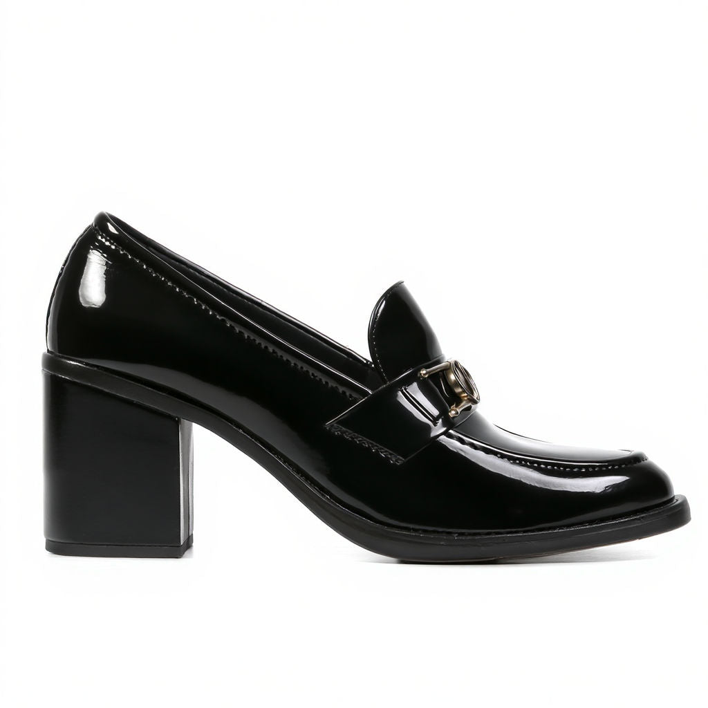 Black patent leather shoe with a block heel on a white background