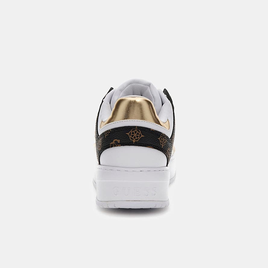 Sneaker with gold and black design on a white background