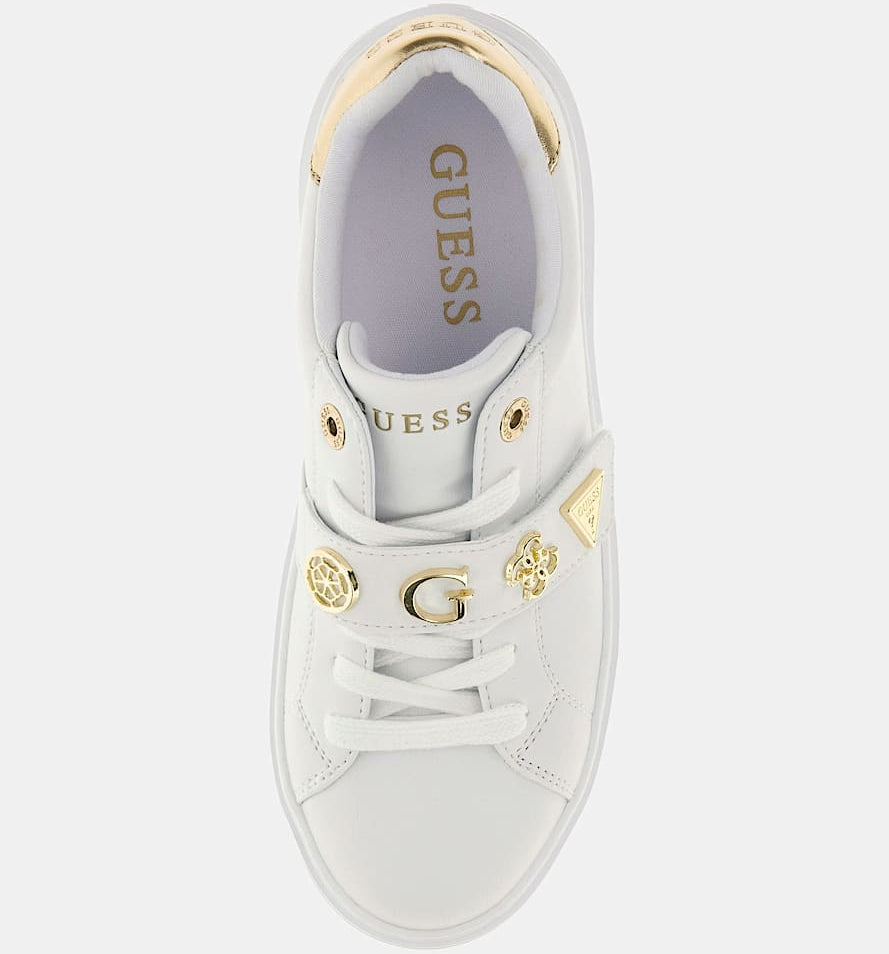 White sneaker with gold accents on a white background