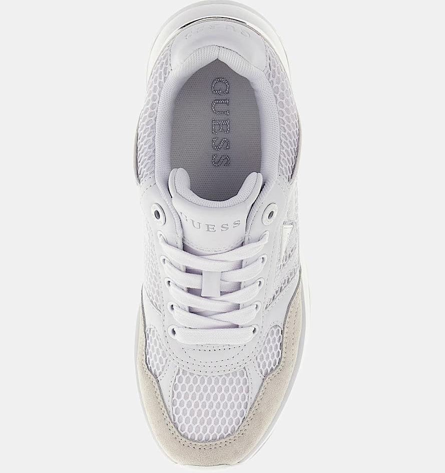 White sneaker with 'Guess' branding on a white background