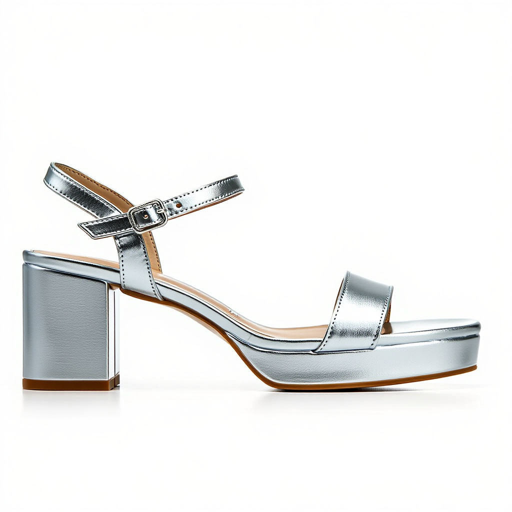 Silver high-heeled sandal on a white background
