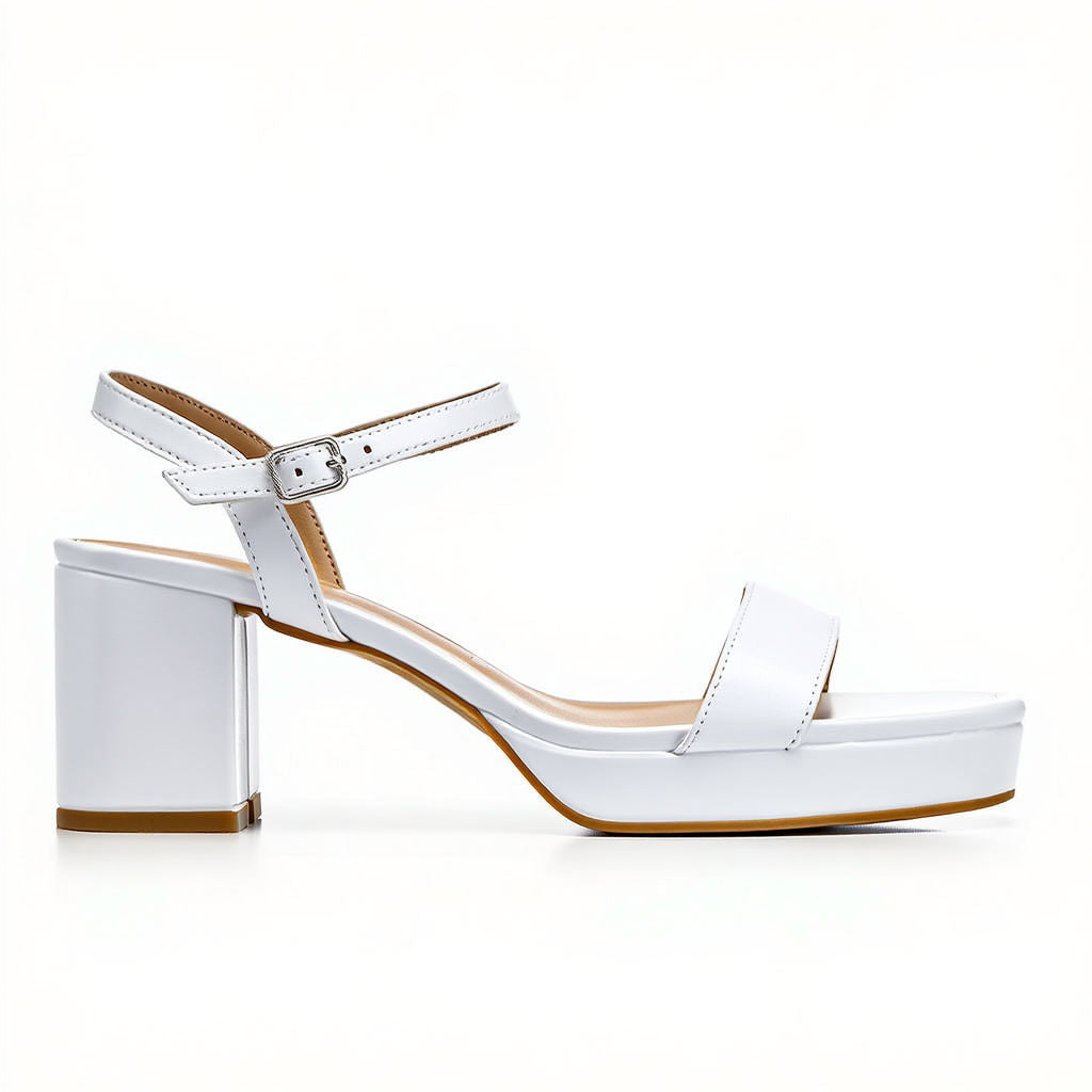 White sandal with block heel on a white background