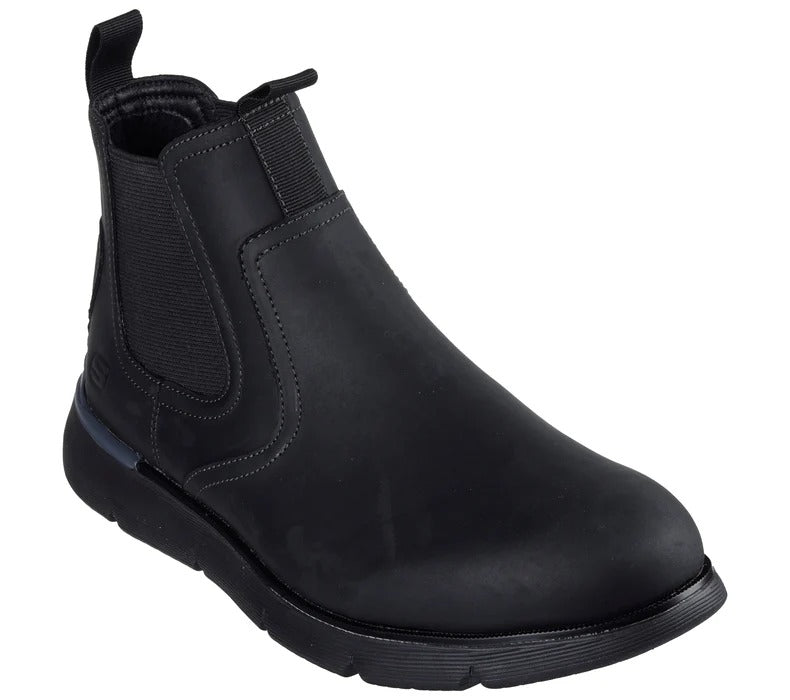 Angled view of Skechers Augustino Paulo black leather boots showing elastic side panels and pull tabs.