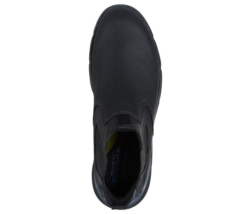 Top view of Skechers Augustino Paulo black boots showing the slip-on opening and inner sole