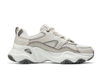 Inner side view of Skechers D'Lites 5.0 Team Neutral sneakers showing layered sole and panel detailing.