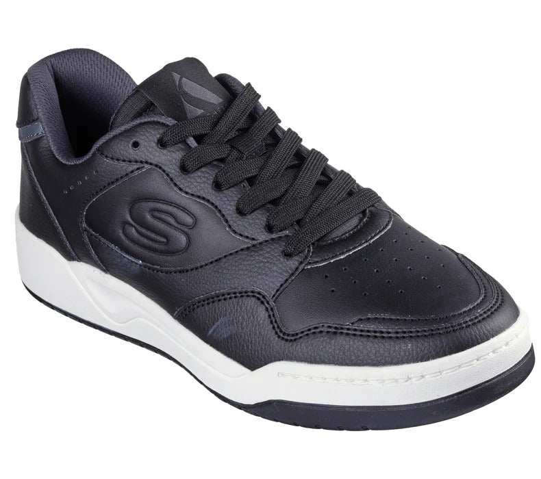 Angled view of Skechers Koopa Volley Low Varsity black sneakers with white sole and leather upper.