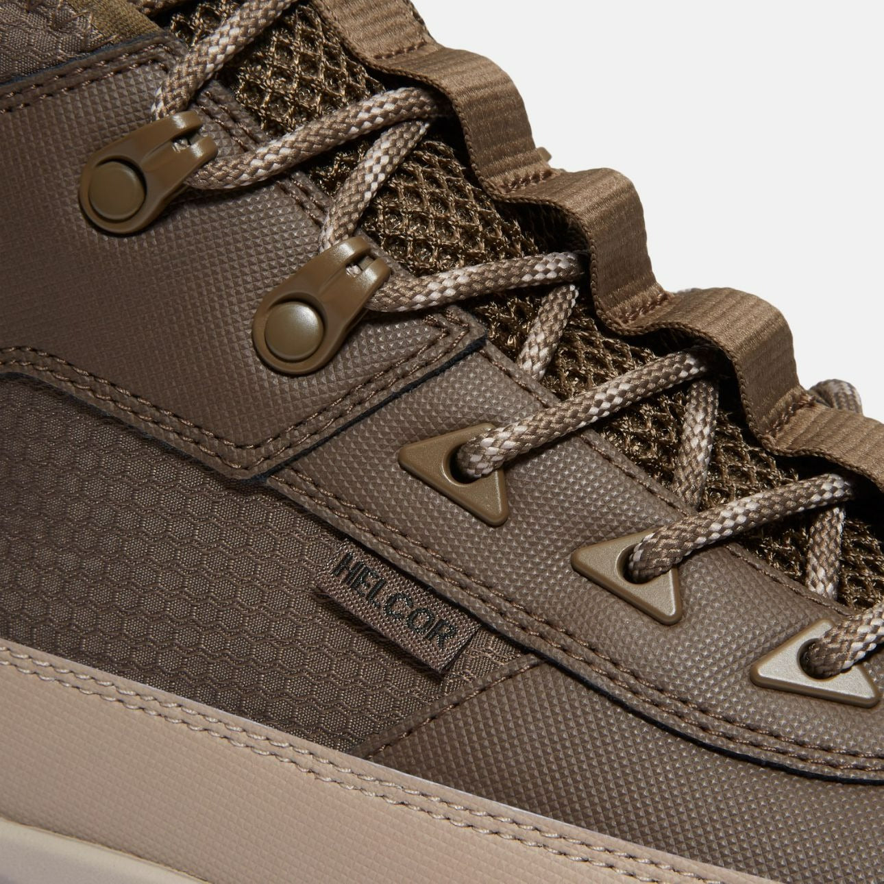Close-up view showing Timberland GS Motion waterproof Helcor upper and lace hooks