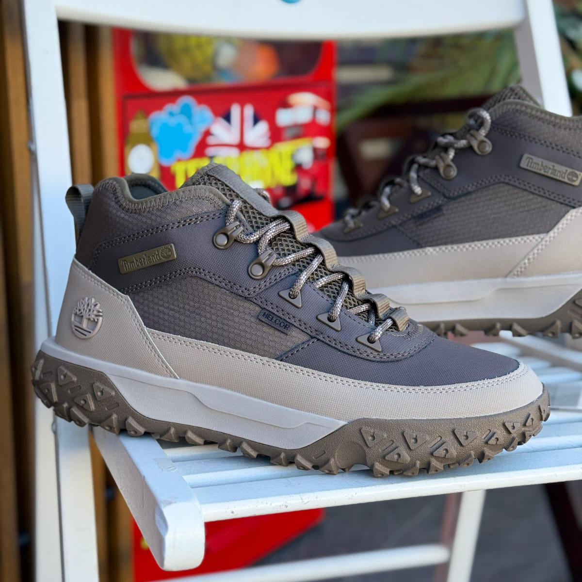 Pair of Timberland GS Motion beige waterproof hiking sneakers with rugged outsole and textile upper.