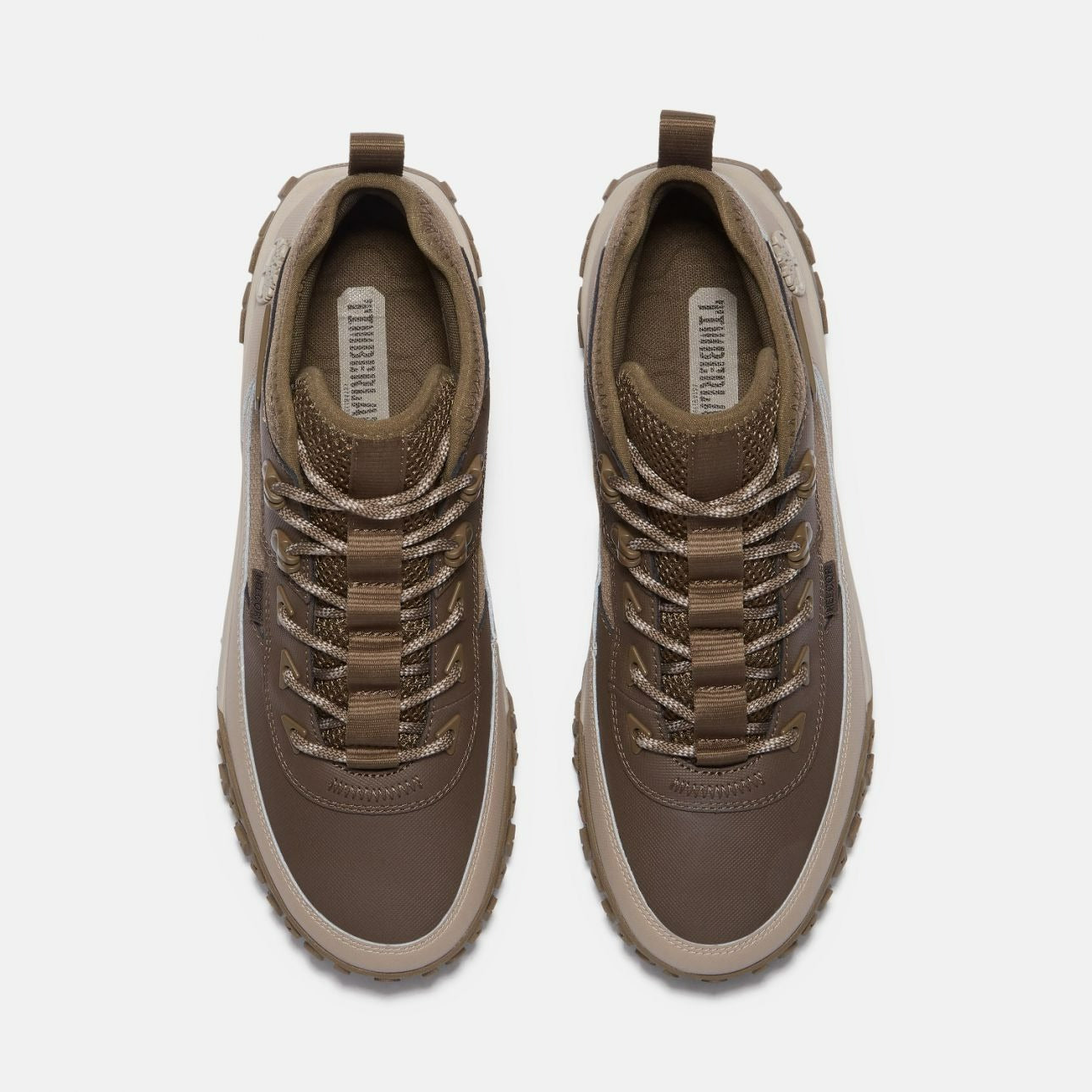 Top view of Timberland GS Motion men’s beige hiking sneakers with durable textile mesh and round laces.