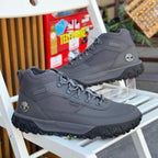 Timberland GS Motion grey men’s hiking boots outdoor on white chair background