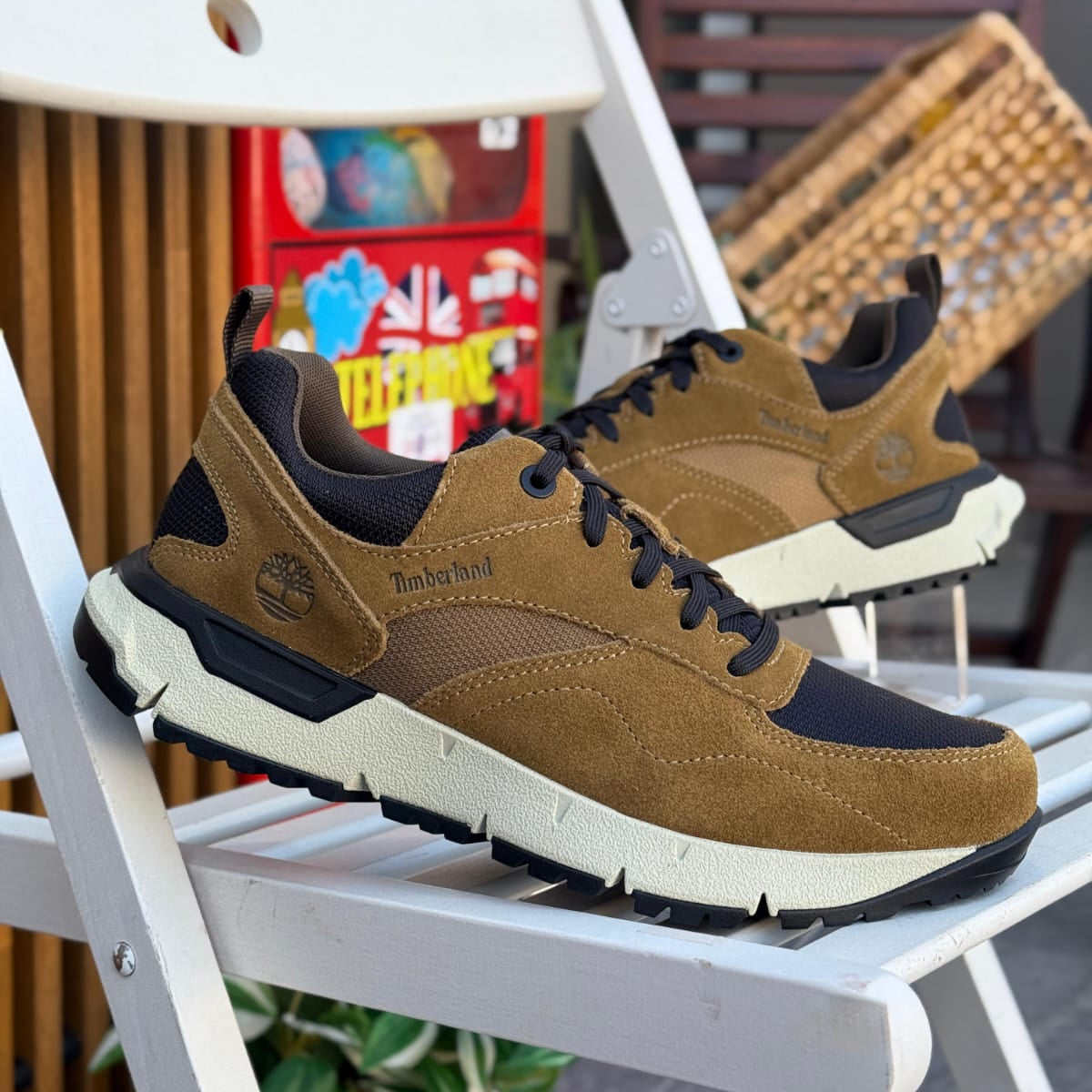 Timberland Voyager Park Low Lace-Up brown black men’s sneakers outdoor on white chair background