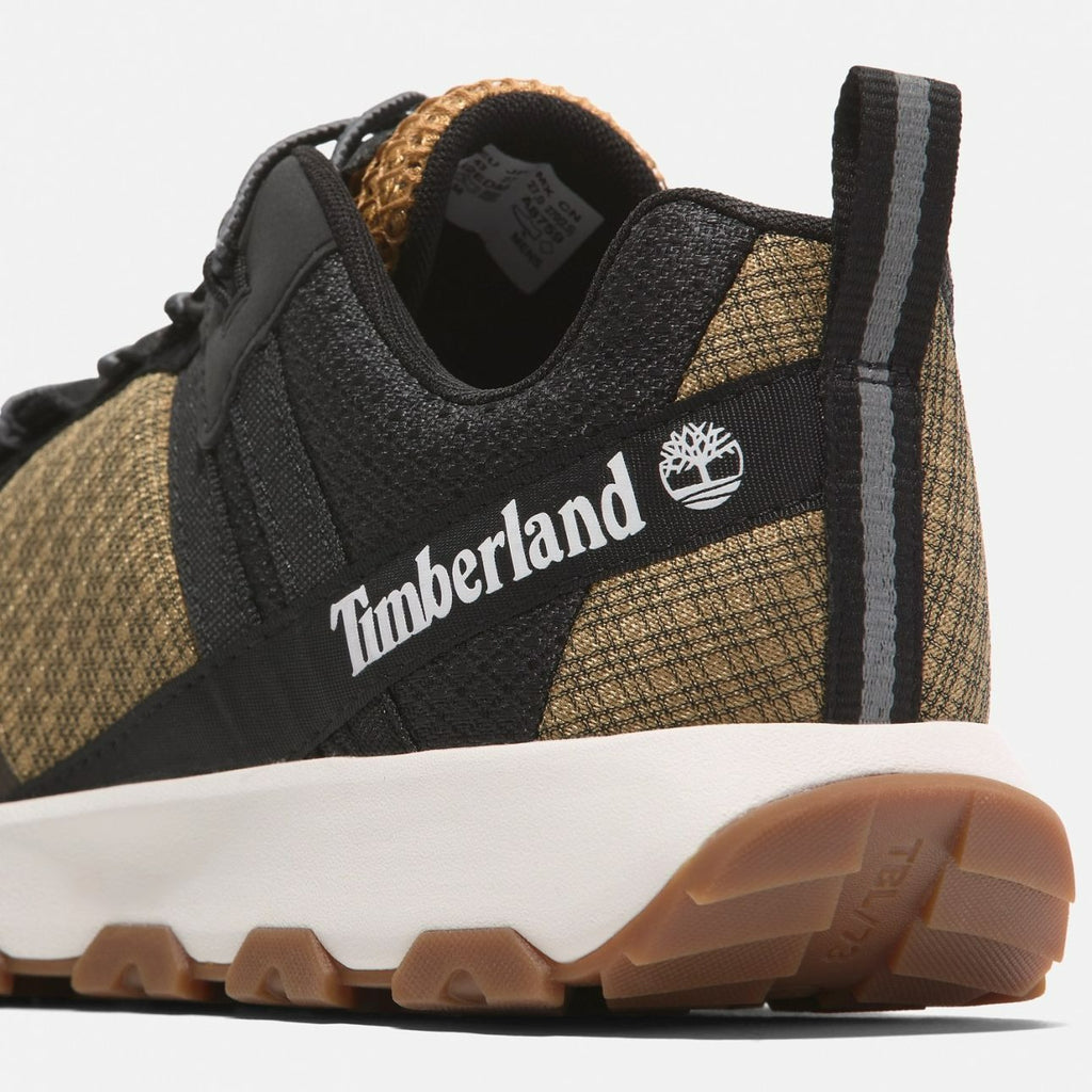 Timberland Winsor Trail black brown men’s sneakers close-up showing Timberland logo on heel