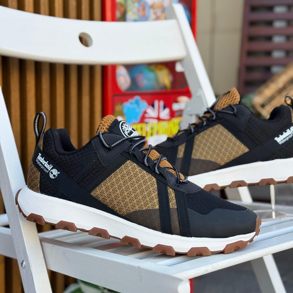 Timberland Winsor Trail black brown men’s waterproof sneakers outdoor on white chair background
