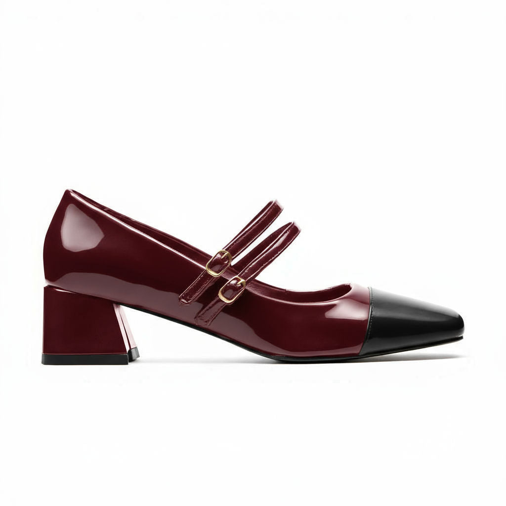 Women's Bordeaux burgundy patent leather Mary Jane heels with black cap toe and gold buckles