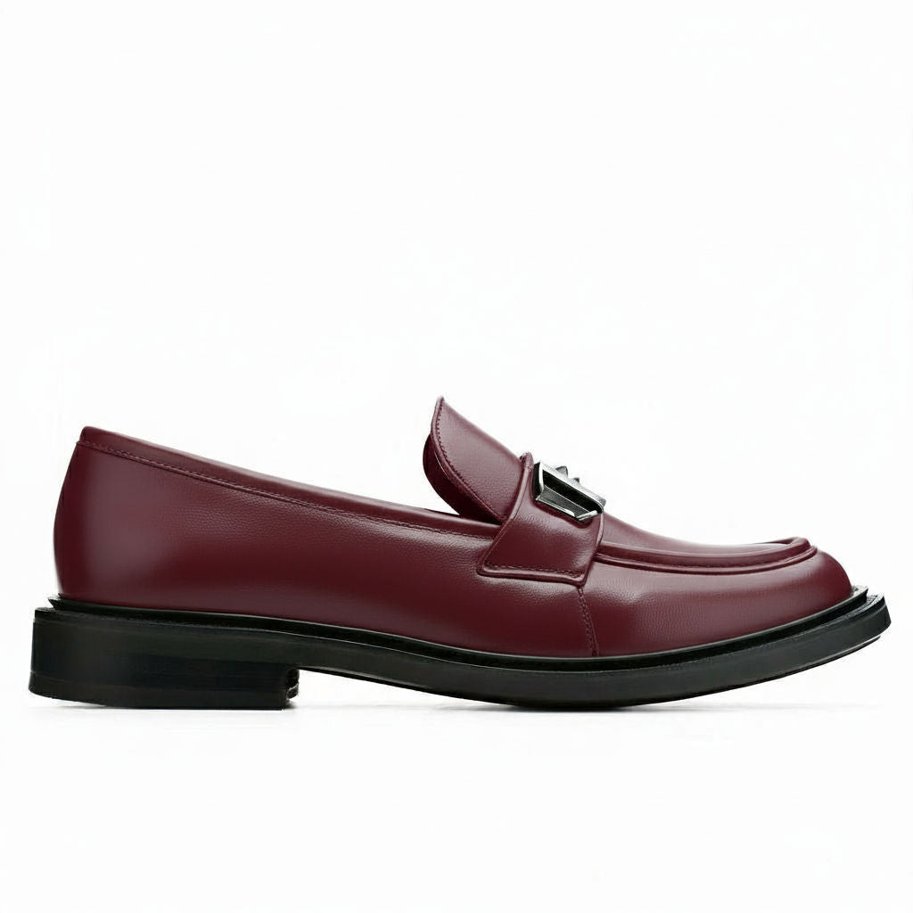 burgundy loafer shoe on a white background