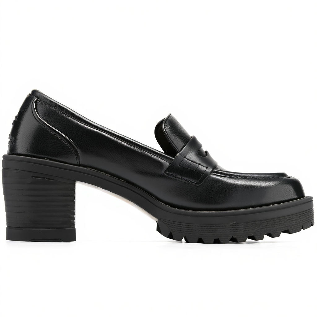 Black platform loafer shoes on a white background