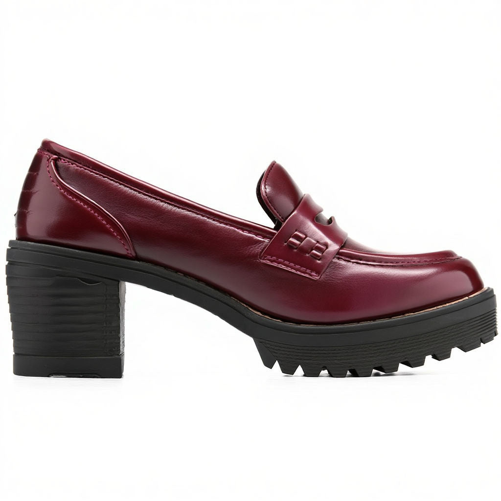 Maroon loafer shoe with a black sole on a white background